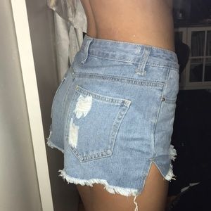 light blue wash destroyed jean shorts